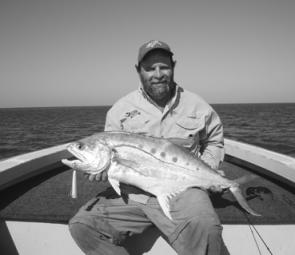 The author with a solid queenfish caught on a Trollcraft popper.
